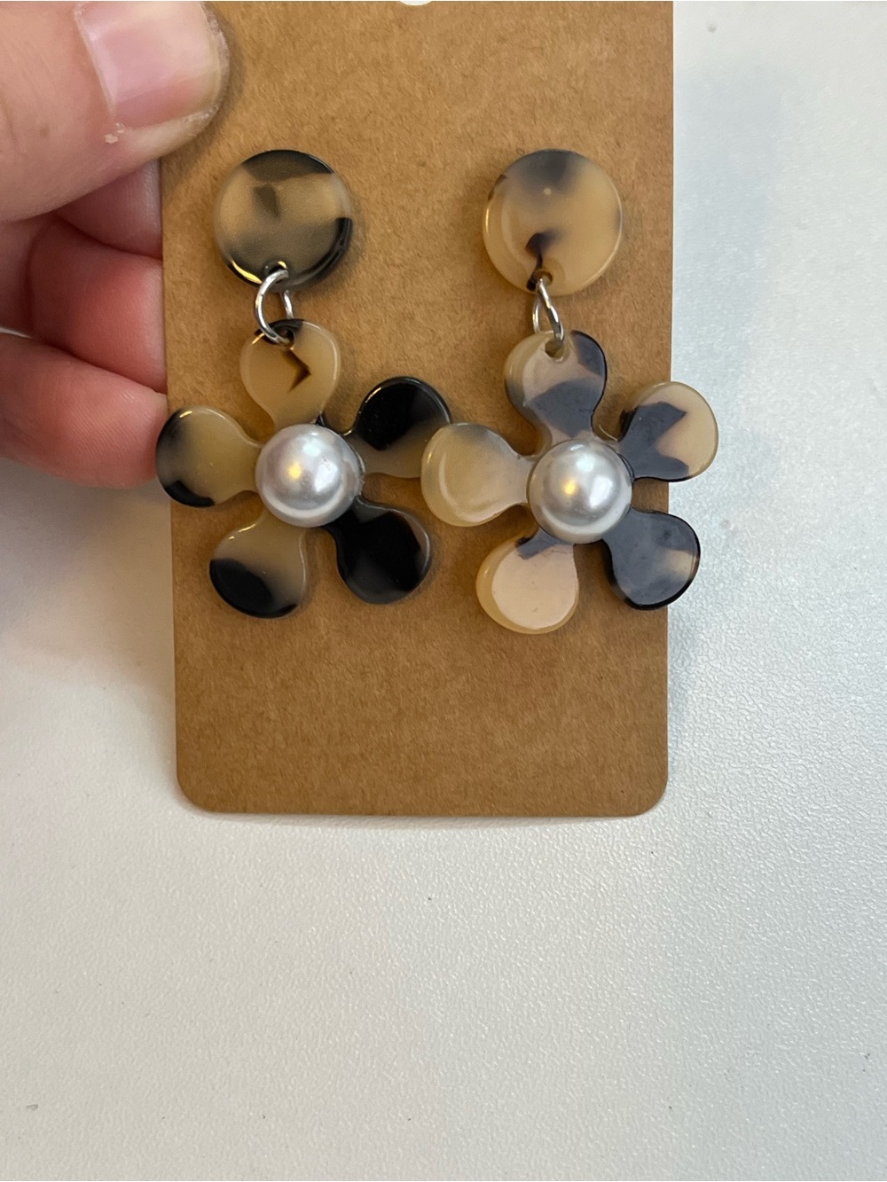 Fun faux pearl daisy acrylic earrings black and brown